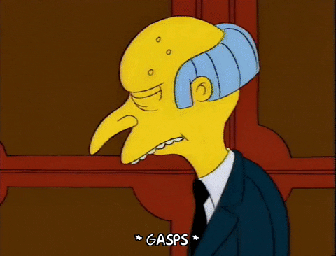 Mr Burns panics and runs for an escape pod hidden behind a concealed panel.